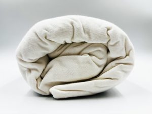 90×200 Palags ar gumiju Jersey - 100% kokvilna (krēmīgi balts)